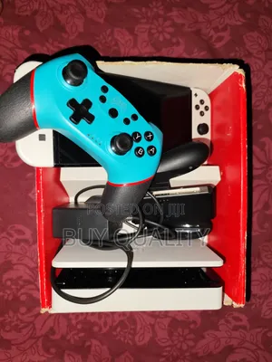 Nintendo Switch Oled With Pro Controller and Original Nintendo Charger