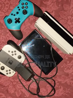 Nintendo Switch Oled With Pro Controller and Original Nintendo Charger