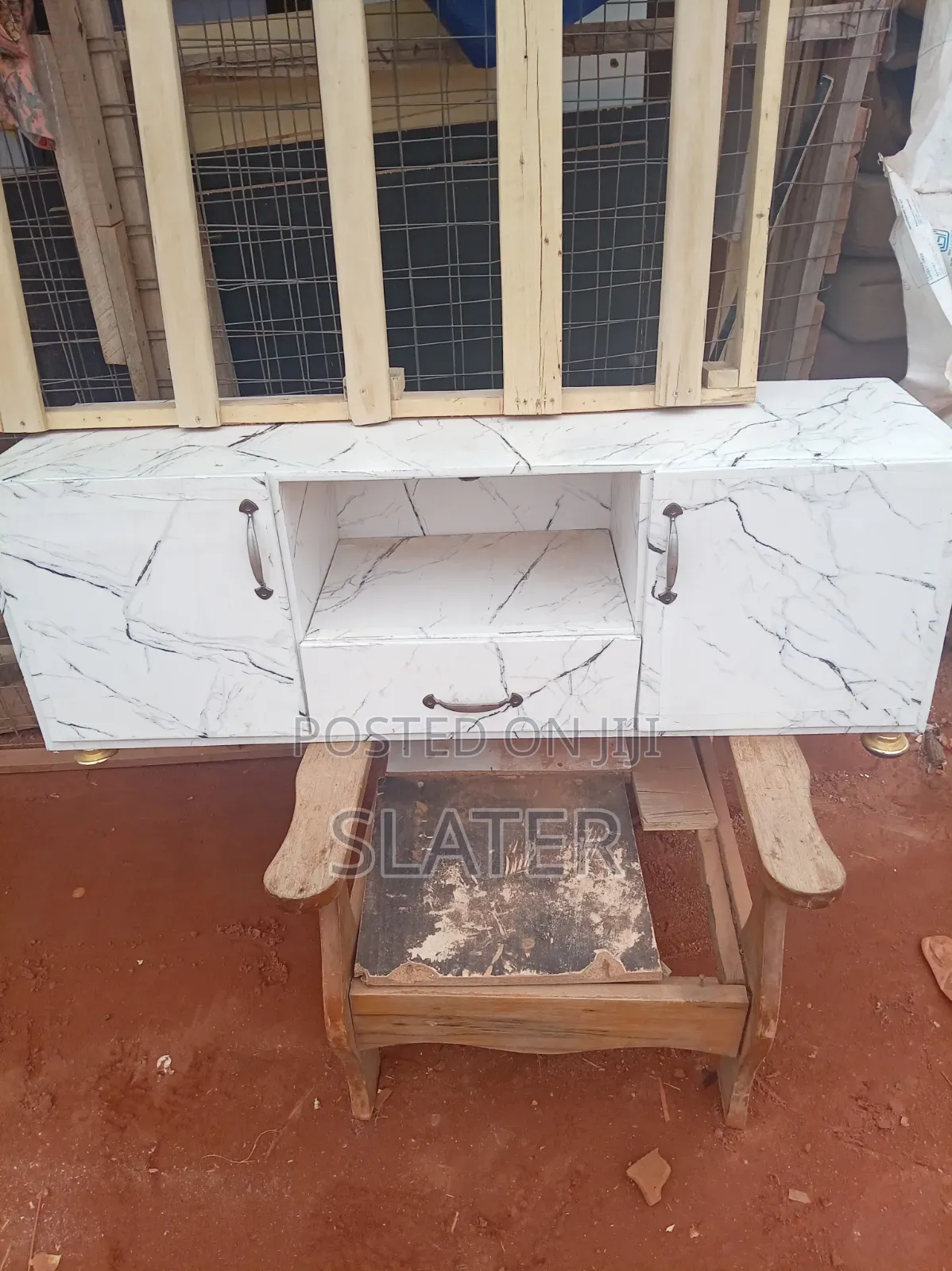 A Four Foot Neatly Used TV Stand. White Color