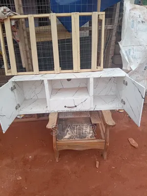 A Four Foot Neatly Used TV Stand. White Color