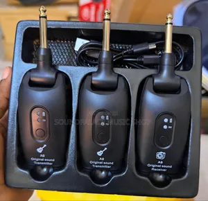 A9 Wireless Guitar System That Includes a Transmitter and a Receiver.
