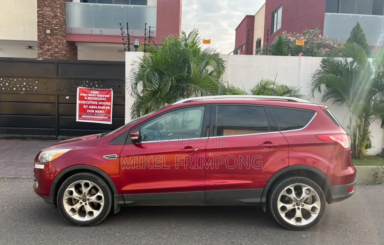 Ford Escape Titanium 4dr SUV AWD  (1.6L 4cyl Turbo 6A) 2014 Red
