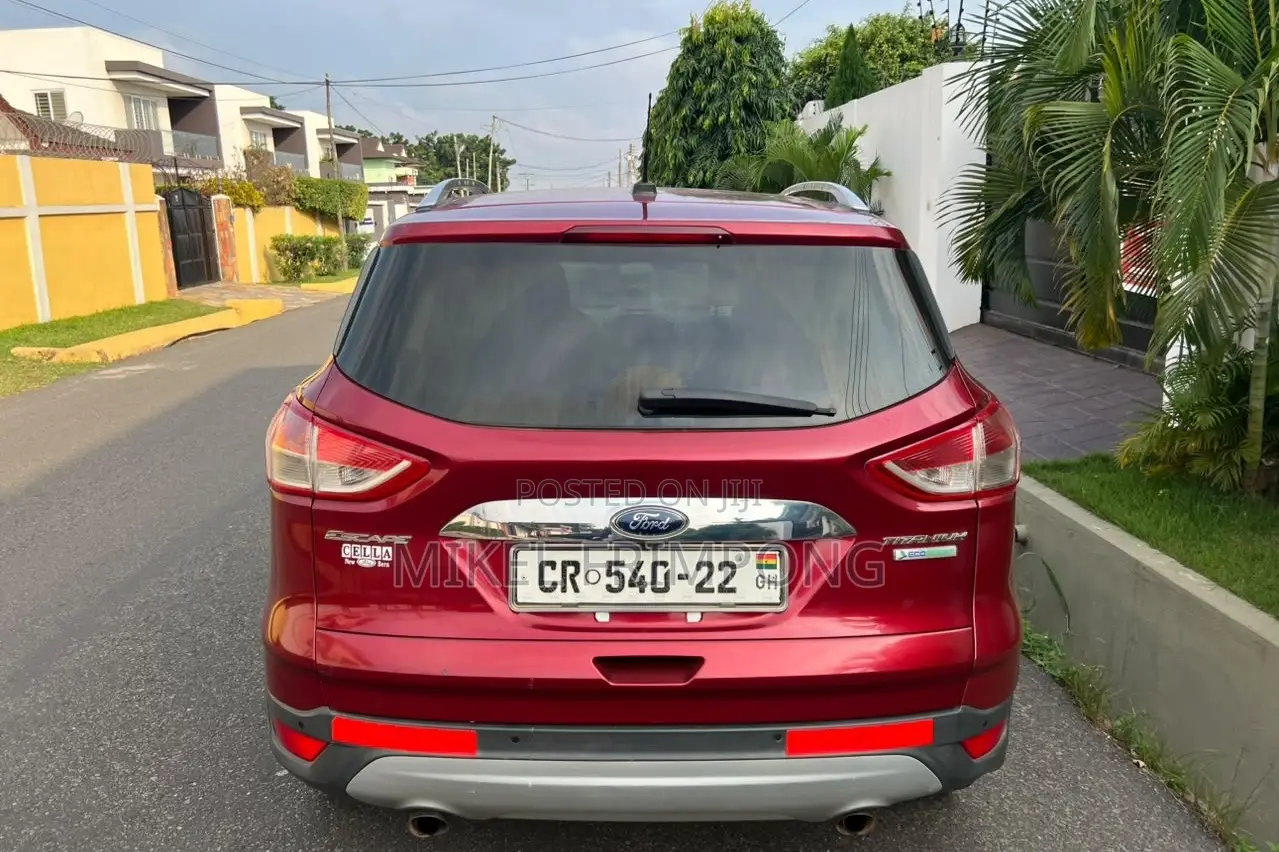 Ford Escape Titanium 4dr SUV AWD  (1.6L 4cyl Turbo 6A) 2014 Red