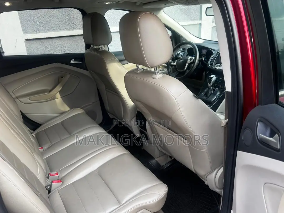 Ford Escape Titanium 4dr SUV AWD  (1.6L 4cyl Turbo 6A) 2014 Red