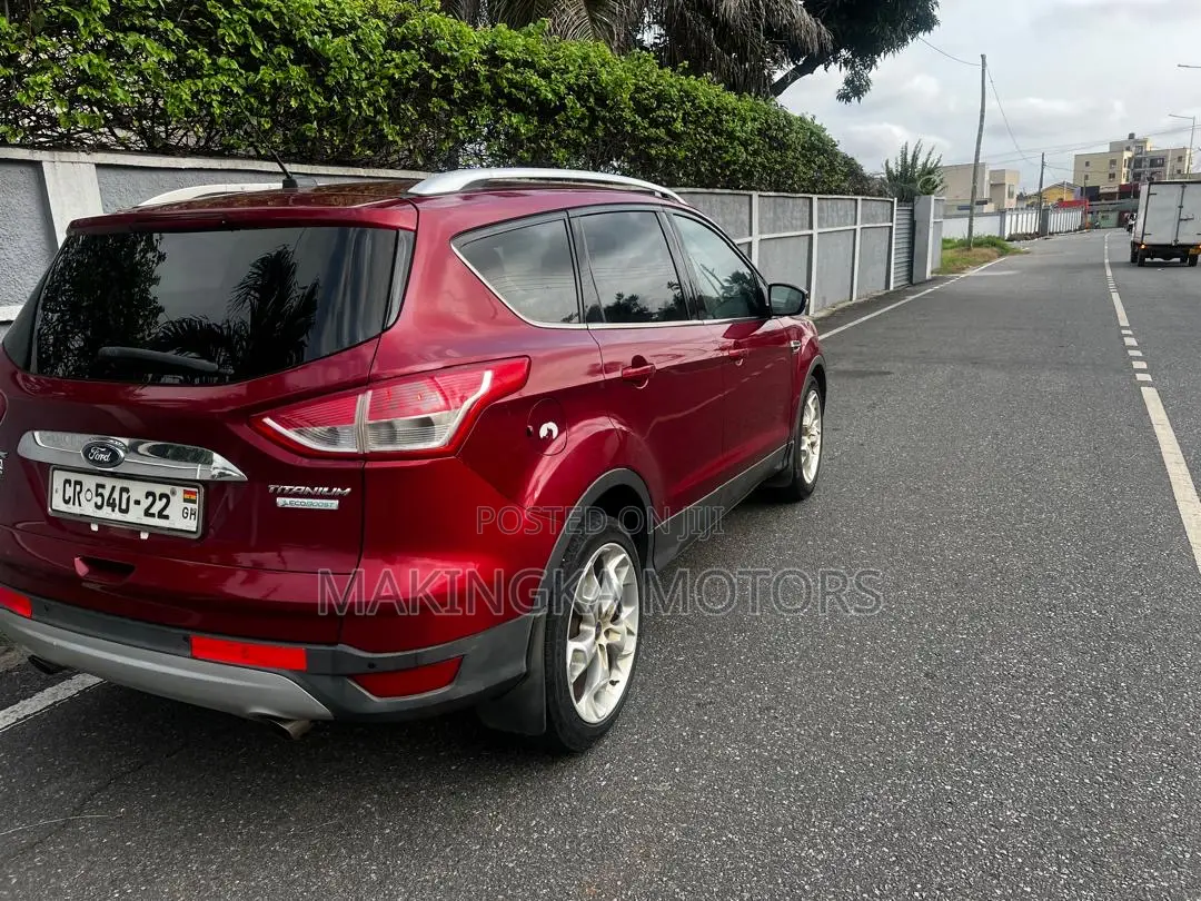 Ford Escape Titanium 4dr SUV AWD  (1.6L 4cyl Turbo 6A) 2014 Red