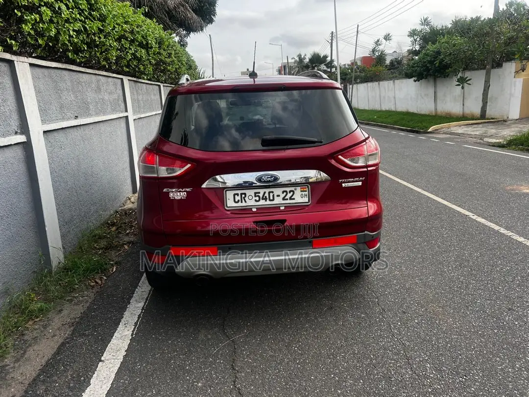 Ford Escape Titanium 4dr SUV AWD  (1.6L 4cyl Turbo 6A) 2014 Red