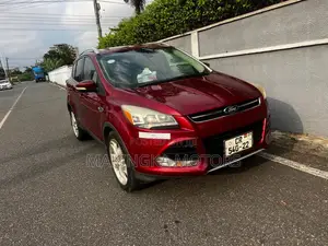 Ford Escape Titanium 4dr SUV AWD  (1.6L 4cyl Turbo 6A) 2014 Red