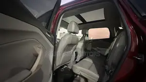Ford Escape Titanium 4dr SUV AWD  (1.6L 4cyl Turbo 6A) 2014 Red