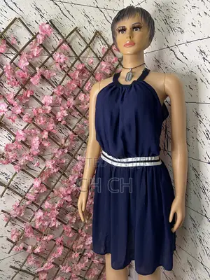 2 Pieces of Beautiful Ladies Dress and a Red Top for 100 Cedis