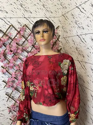 2 Pieces of Beautiful Ladies Dress and a Red Top for 100 Cedis