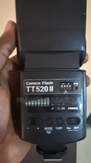 Canon EOS 200D Camera Body With 3 Lenses and a Godox Flash Light.