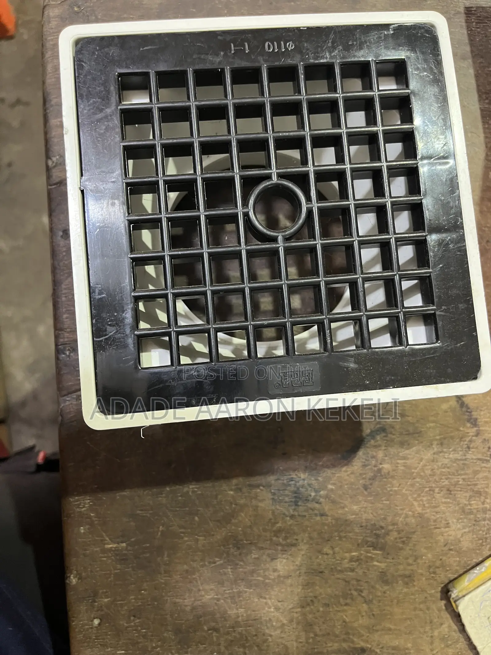 Heavy-Duty PVC Floor Drain With Black Grid Strainer Cover