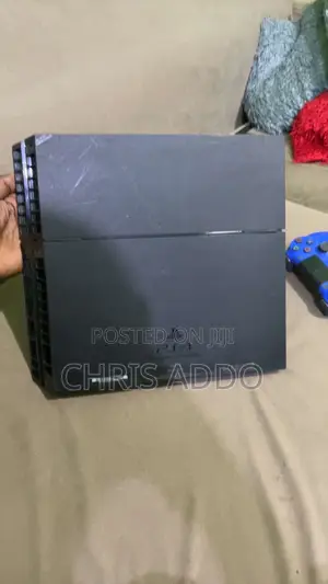 PS4 Console With (FC 26, Mortal Combat Etc)