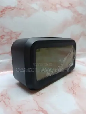 Optically Controlled Digital Alarm Clock With Temperature Display