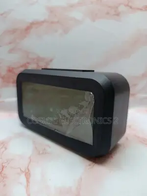 Optically Controlled Digital Alarm Clock With Temperature Display