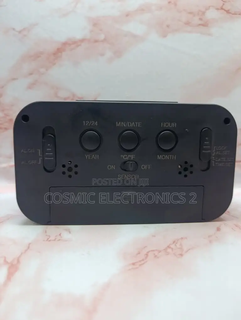Optically Controlled Digital Alarm Clock With Temperature Display