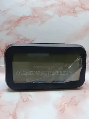 Optically Controlled Digital Alarm Clock With Temperature Display
