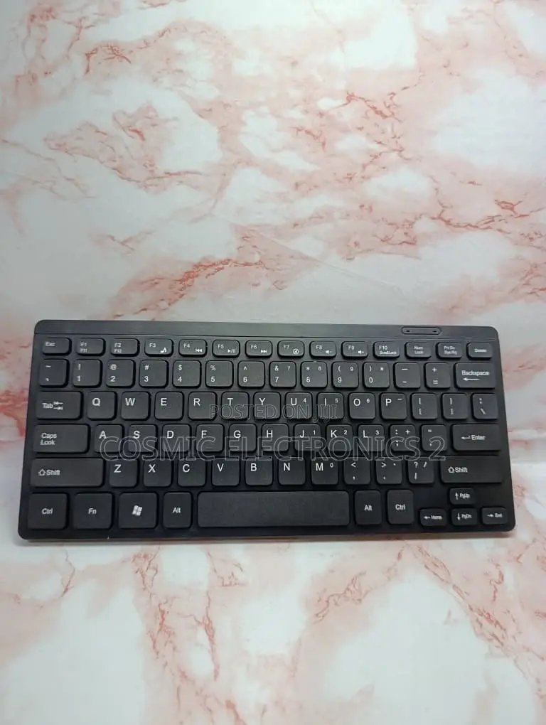 KM901 Compact Wireless Keyboard and Mouse Combo