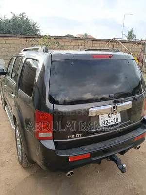 Honda Pilot Touring w/RES/Navi 4WD (3.5L 6cyl 5A) 2013 Burgundy