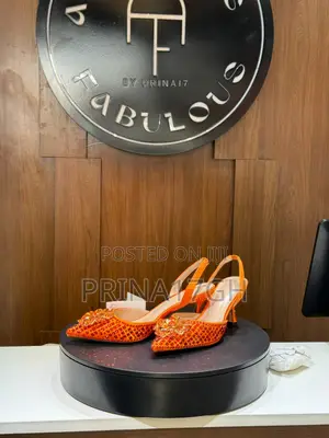 Orange Pointed-Toe Sling Back Heel