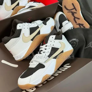 Travis Scott X Air Jordan Jumpman Jack TR in the "Sail and Dark Mocha"