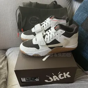 Travis Scott X Air Jordan Jumpman Jack TR in the "Sail and Dark Mocha"