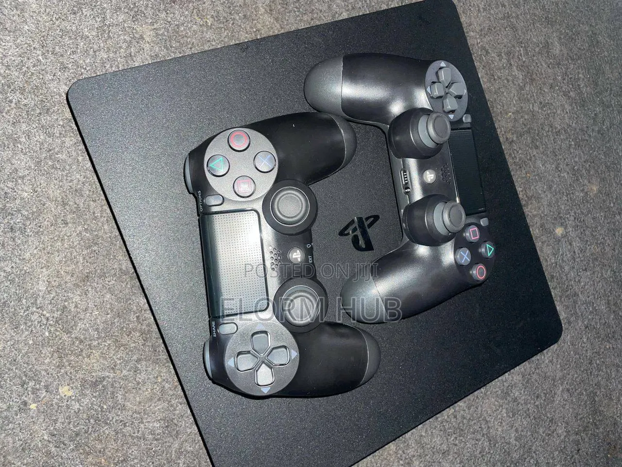 PS4 Slim Loaded With 4 Games 2 Controllers