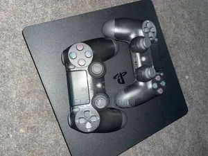 PS4 Slim Loaded With 4 Games 2 Controllers