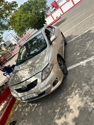 Toyota Corolla LE 4dr Sedan (1.8L 4cyl 4A) 2010 Gold
