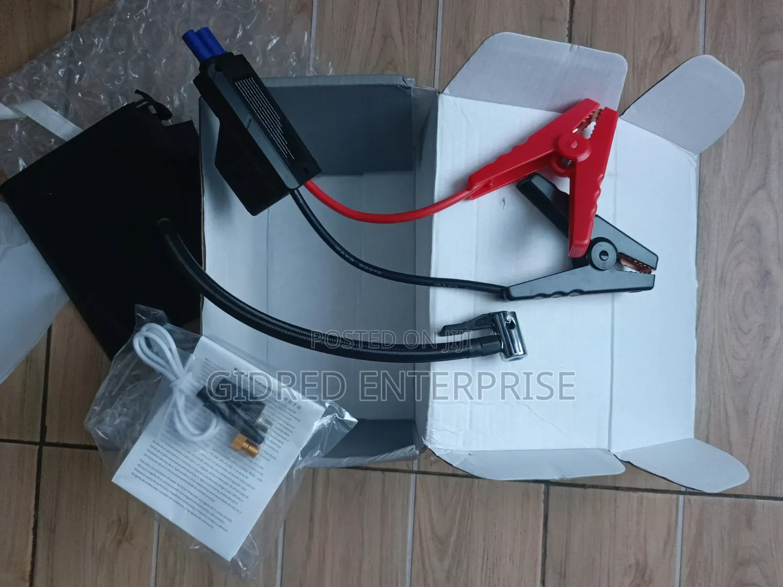 Portable Car Jump Starter Pack, Tire Inflator, Flashlight, Power Bank.