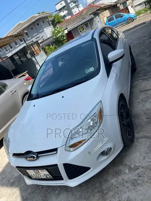 Ford Focus S Sedan FWD (2.0L 4cyl 5M) 2013 White
