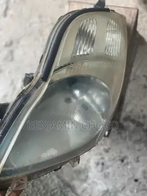 Toyota Vitz 2009 Headlight(Charger Type)