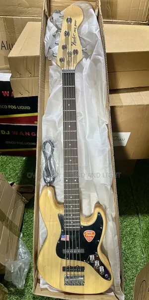 Fender 5-String Electric Bass Guitar With a Natural Wood Finish
