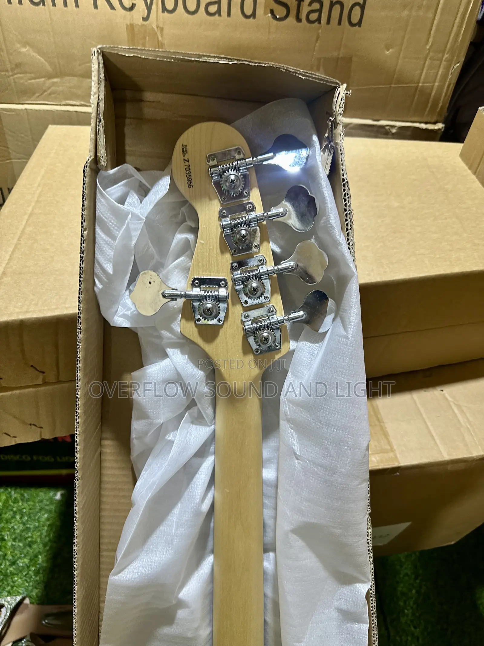 Fender 5-String Electric Bass Guitar With a Natural Wood Finish