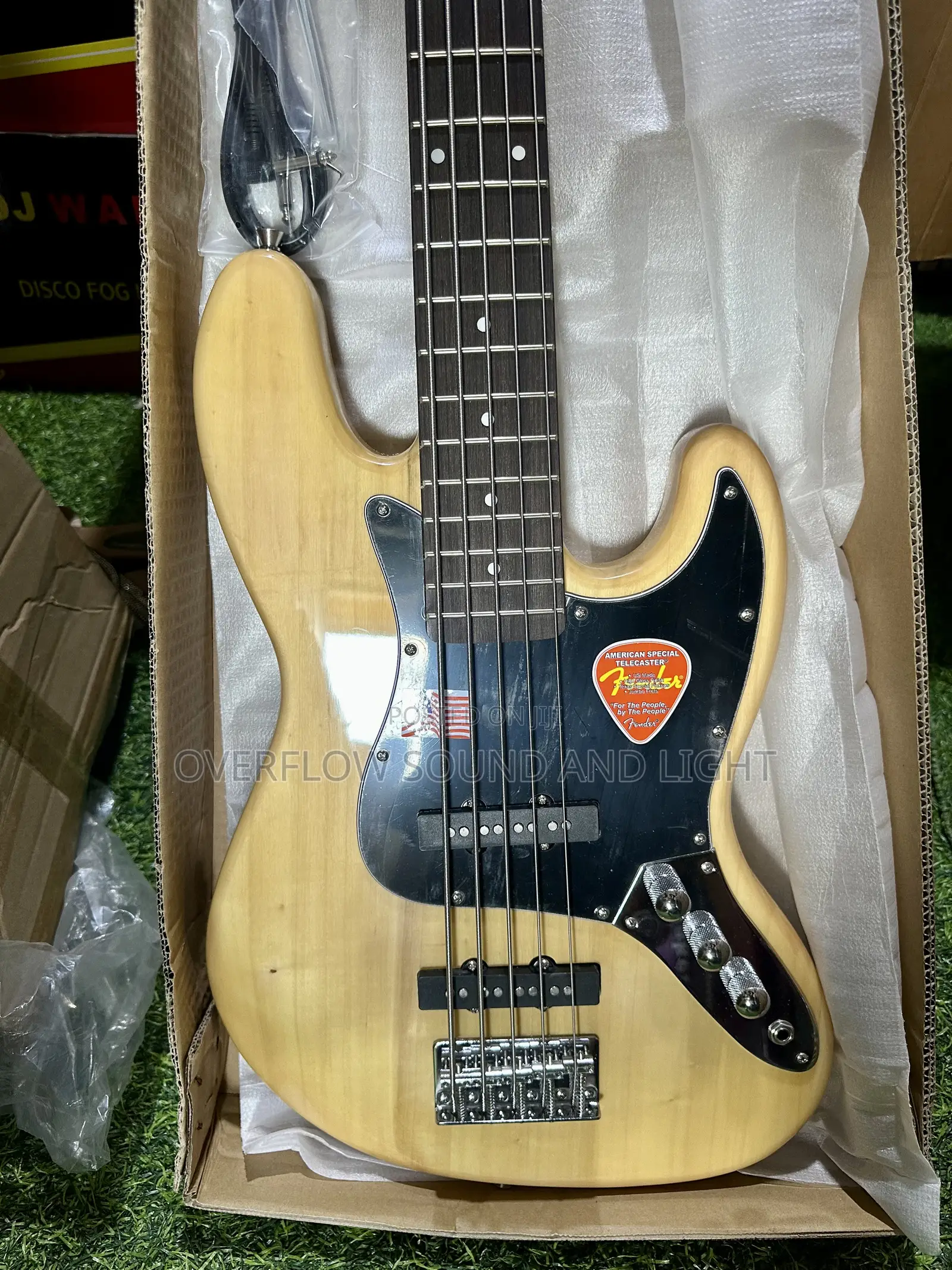 Fender 5-String Electric Bass Guitar With a Natural Wood Finish