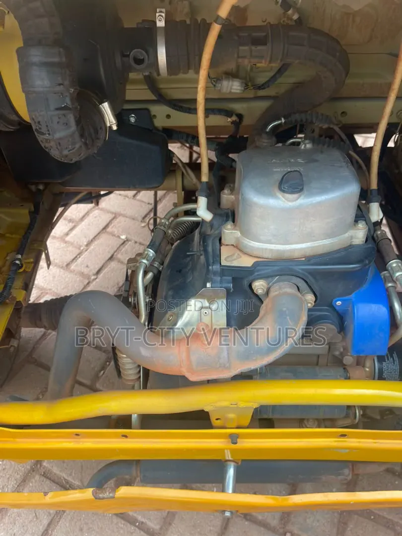 Bajaj RE 2025 Yellow