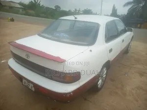 Toyota Camry LE Sedan 1995 White