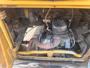 Bajaj RE 2024 Yellow