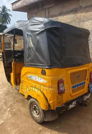 Bajaj RE 2024 Yellow