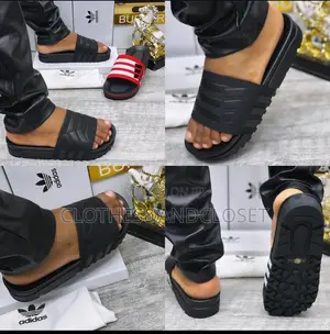 Adidas Slides,three-Stripe Bandage Upper and a Thick Textured Outsole.