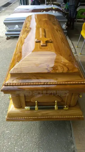 High-Gloss Wood-Finish Casket With Cross