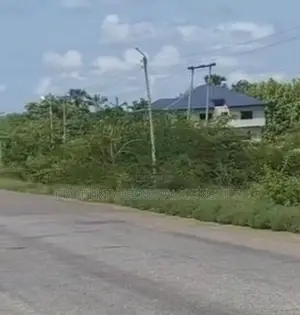 One Acre Roadside Land in Ho
