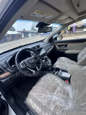 Honda CR-V Touring 4dr SUV AWD (1.5L 4cyl CVT) 2017 Off white