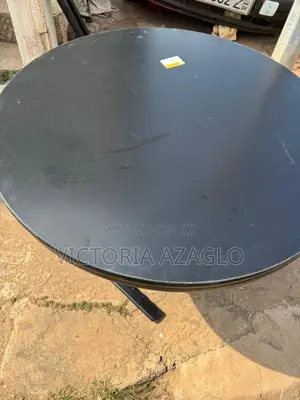 Round Cantilever Table