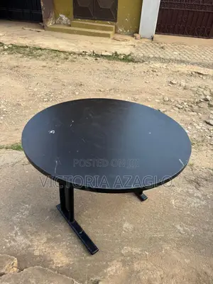 Round Cantilever Table