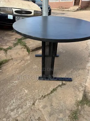 Round Cantilever Table