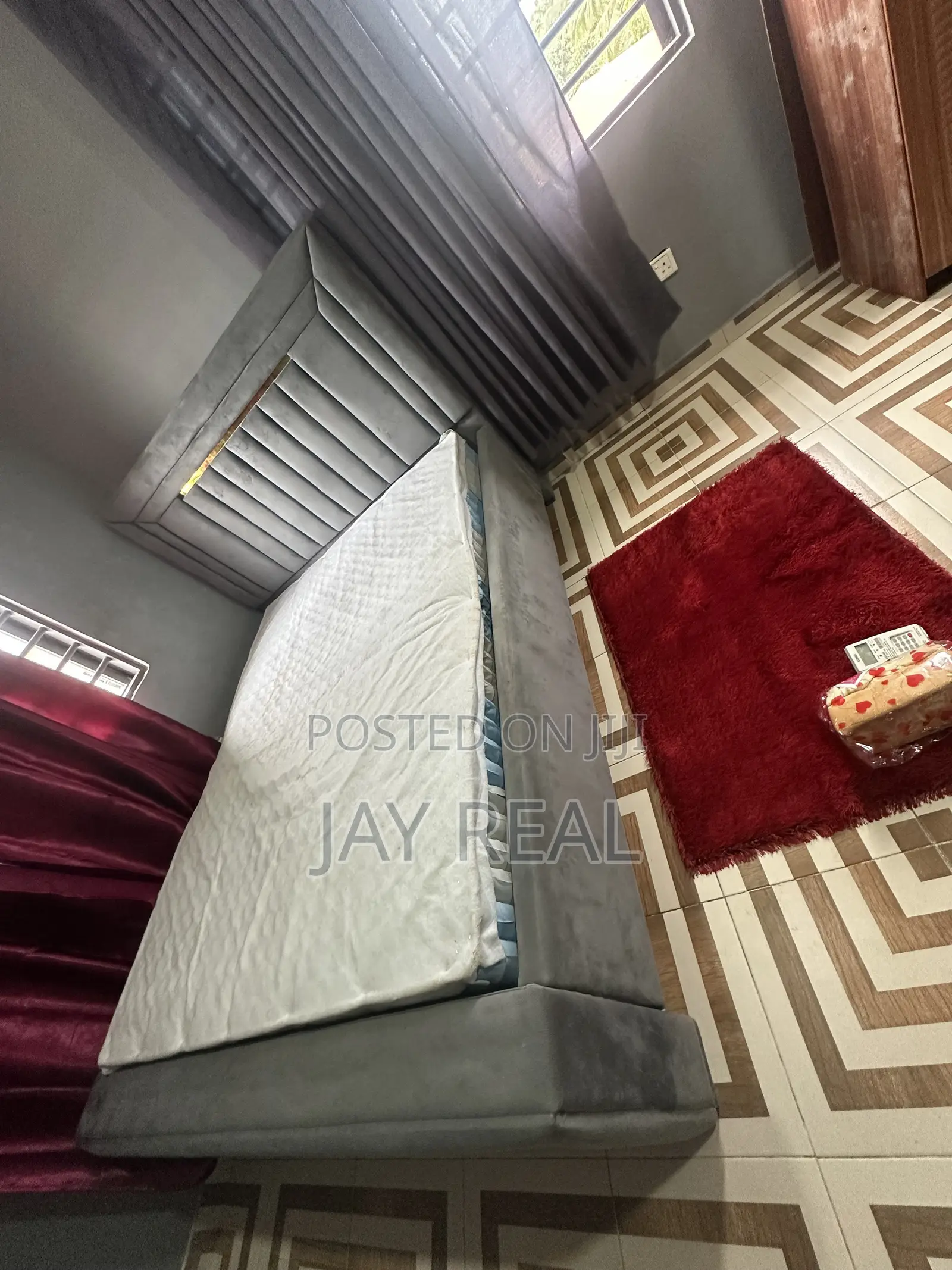 A Foreign Mattress and Bed-Stand for Sale.