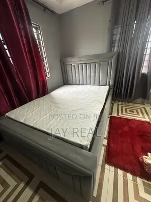 A Foreign Mattress and Bed-Stand for Sale.