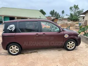 Toyota Sienta 2012 Brown