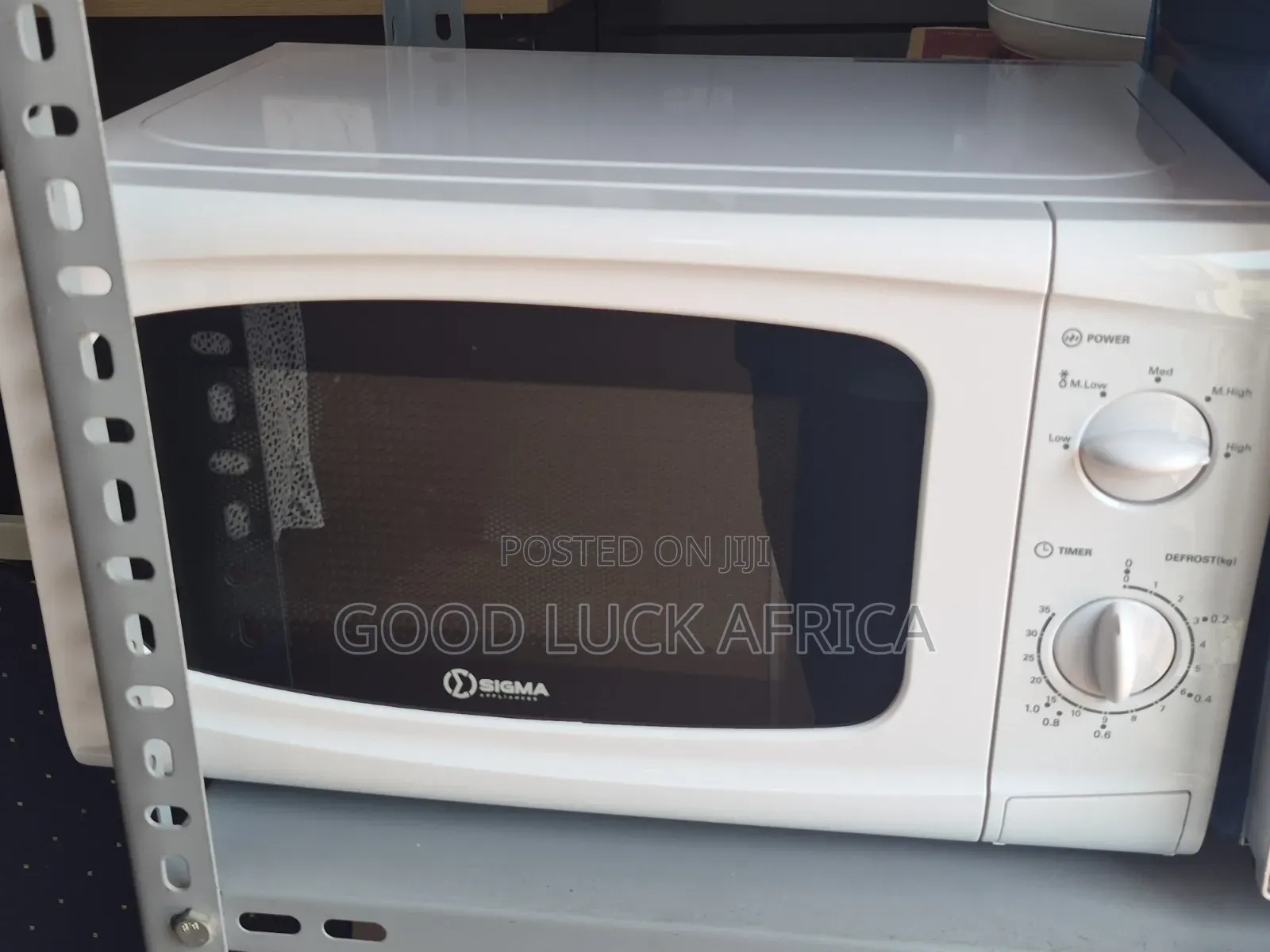 20 Liter Microwave Sigma - Quick Heating Everyday Convenience